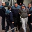 Alexandru Huțuleac, în timp ce era dus în fața magistraţilor de la Tribunalul Suceava, cu propunere de arestare preventivă